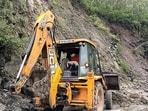Rampur, July 29 (ANI): A JCB machine clears the pile of debris after a landslide occurred due to incessant rains, in Rampur, Himachal Pradesh on Saturday. (ANI Photo)(ANI)